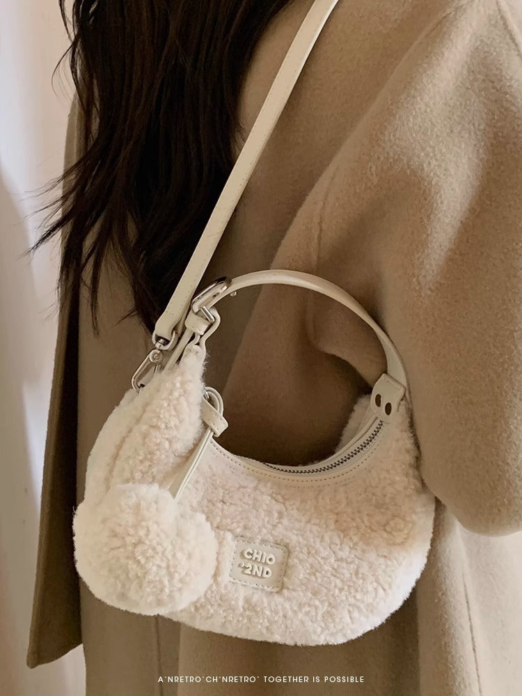 The Perfect Accessory for Fall & Winter – White Moonlight Crescent Bag